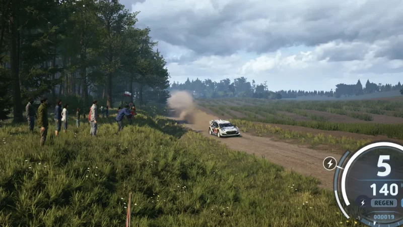 EA Sports WRC 24 screenshot, rally car kicking up dust on a forest gravel stage with roadside fans.