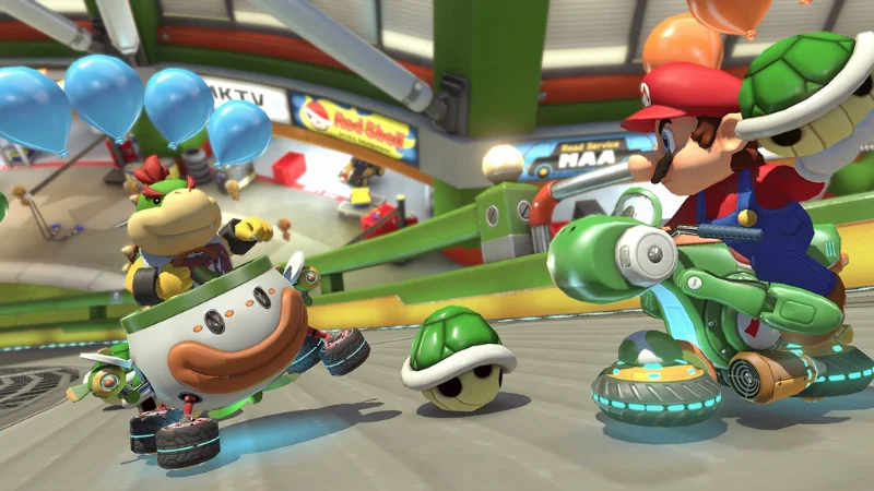 Mario vs Bowser Jr. in balloon battle in MK8 Deluxe.